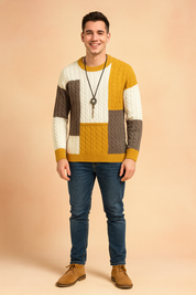 Men’s cable knit color block sweater in mustard yellow, white, and grey with ribbed cuffs and hem, modern patchwork design for stylish winter wear