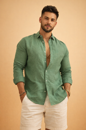 Men’s relaxed-fit green long-sleeve button-up shirt styled with tailored white shorts for a refined summer look