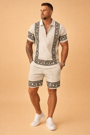 Men’s luxury summer matching set featuring a short sleeve zip polo shirt and tailored shorts in a light off white geometric woven fabric with black Greek key trim accents, crafted with a textured pattern, structured collar, front zipper detail, and coordinated patterned shorts for a refined modern resort look.