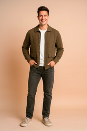Men’s classic button-up cardigan in olive green with front pockets and ribbed cuffs, paired with a simple white undershirt for a timeless layered look.