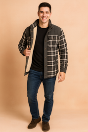 Men's warm plaid flannel jacket with black and white check pattern, button closure, chest pockets, and soft beige fleece lining for comfort and winter style.