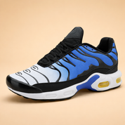 Men’s urban comfort sneakers with dynamic sole design, cushioned heel support, and modern athletic silhouette for everyday wear