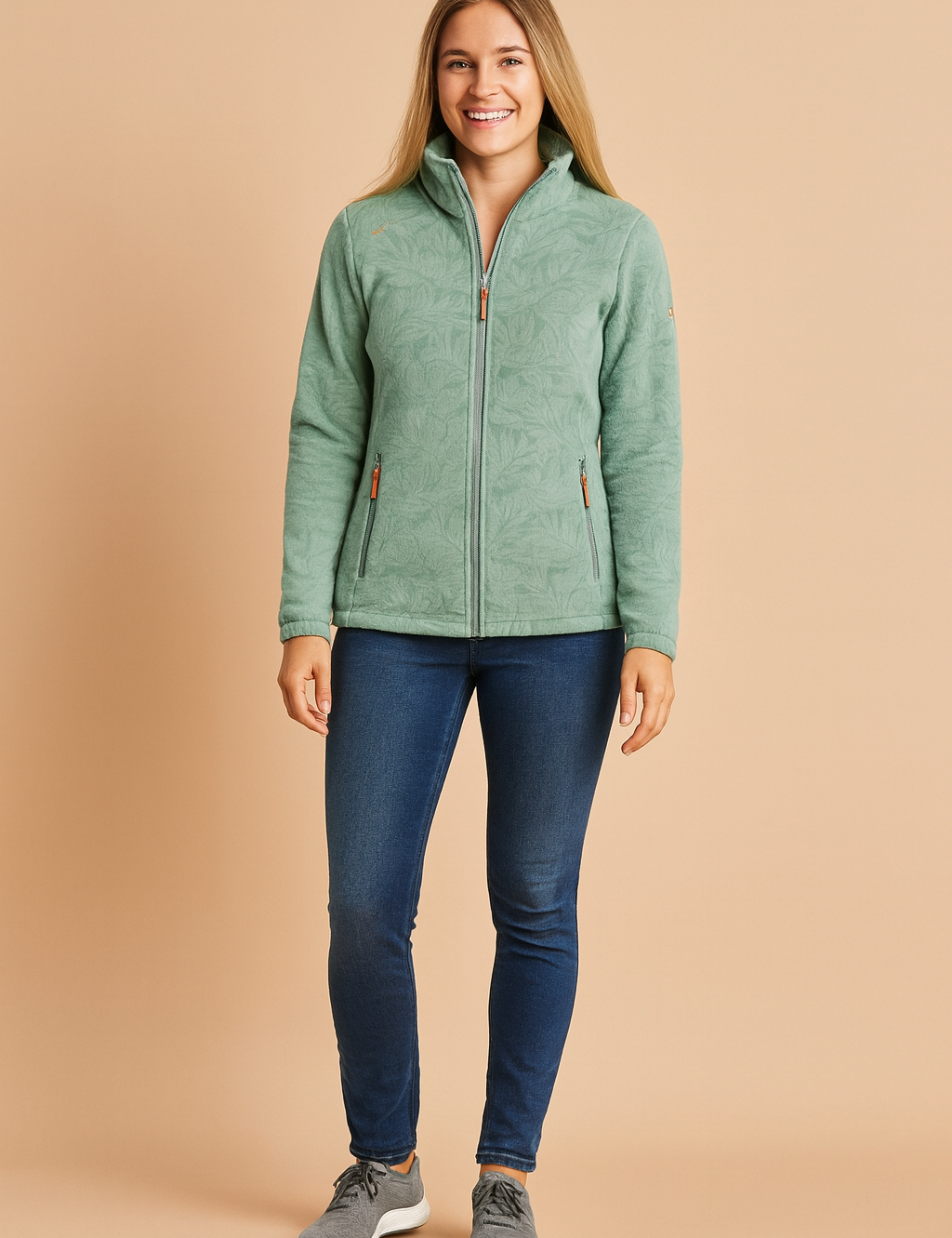 Mint green fleece jacket with subtle leaf pattern, zip-up front, and side zip pockets for a modern casual look.