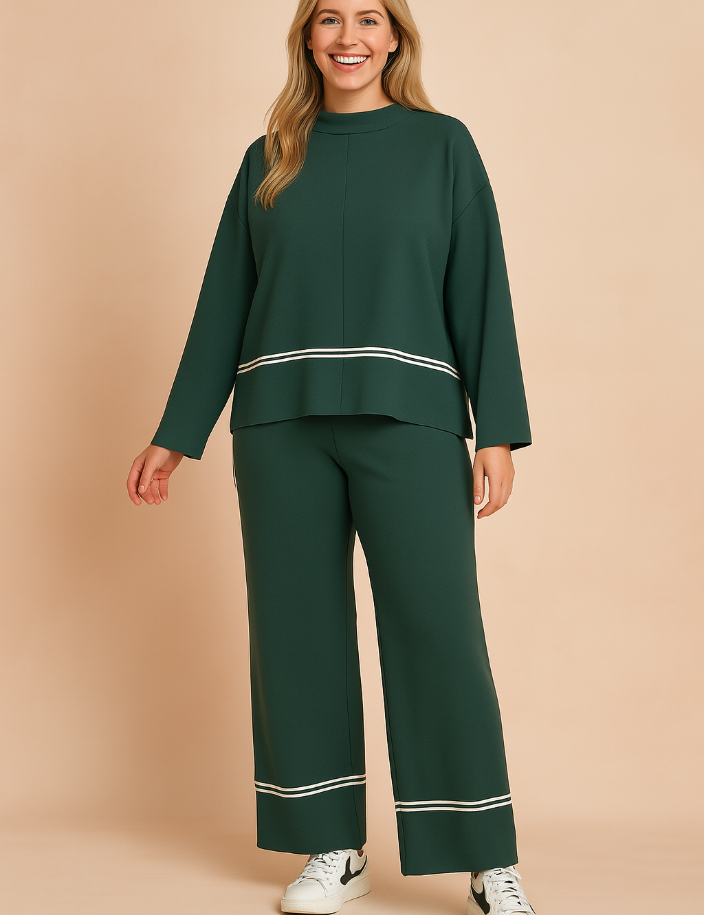Dark green two-piece loungewear set featuring a long-sleeve top with white piping along the hem and wide-leg pants with matching piping at the ankles and side seams, made from soft, textured knit fabric.