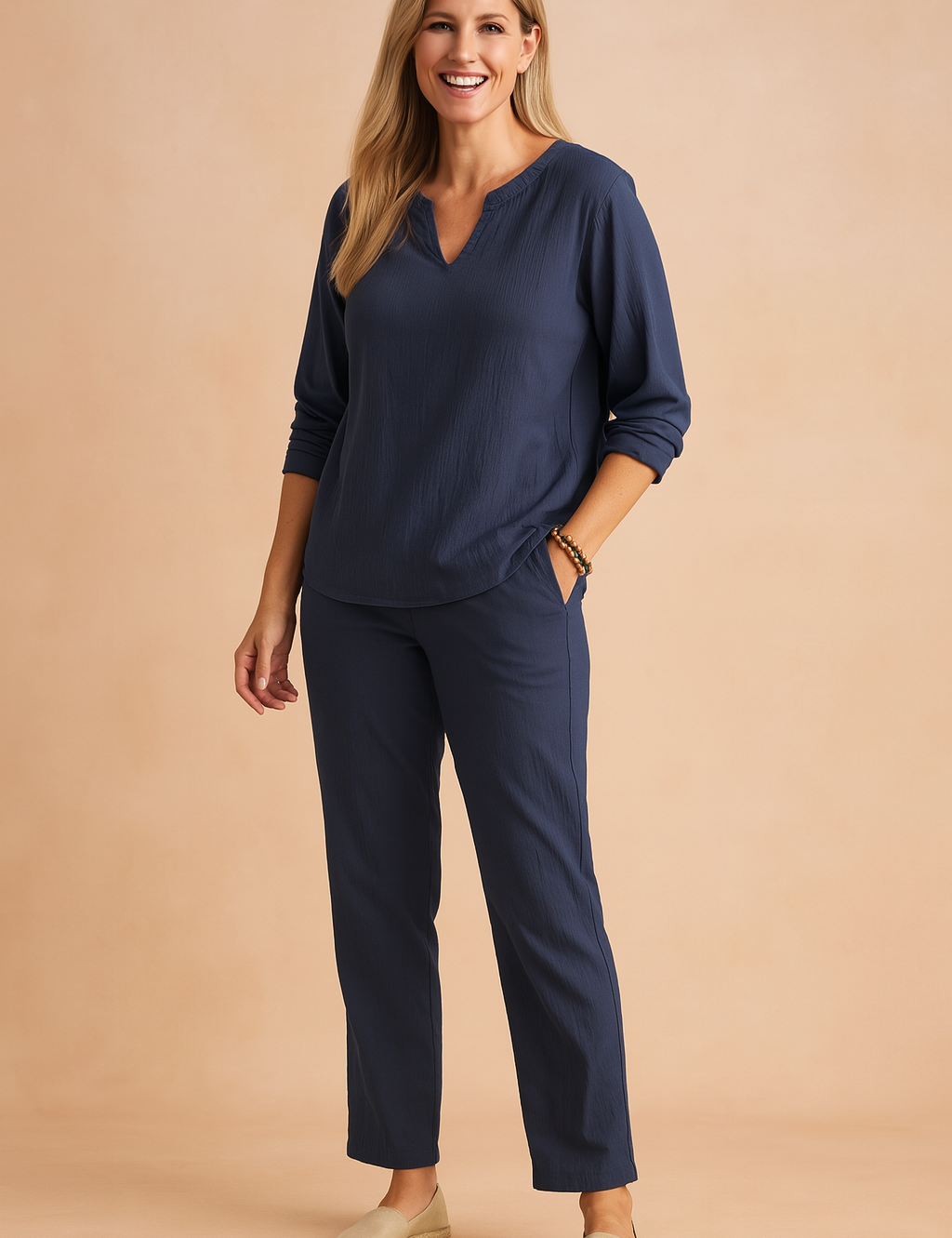 Alt Text:
Relaxed-fit navy blue long-sleeve top paired with matching navy blue straight-leg pants, both crafted in lightweight textured fabric with subtle crinkle detailing for a breezy and casual yet polished look.