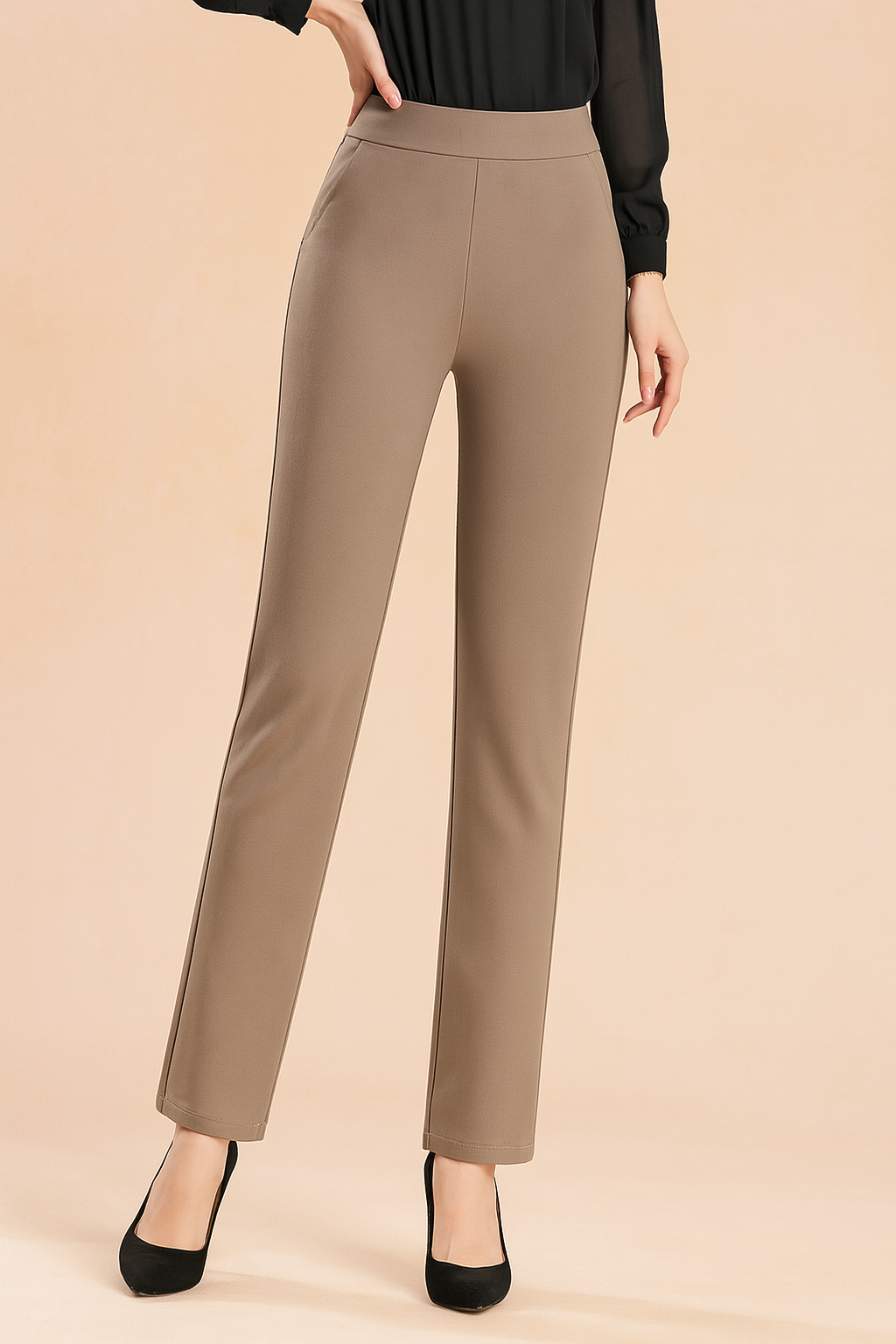 High-waisted taupe straight-leg trousers with a smooth waistband and tailored silhouette, paired with black pointed-toe heels for a refined, professional look.