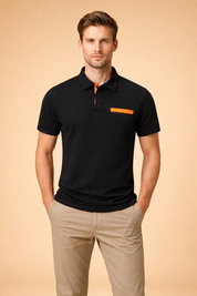 Textured short-sleeve black polo top with subtle grid pattern, contrast button placket detail, and minimal chest accent, paired with tailored beige chinos for a clean modern menswear look