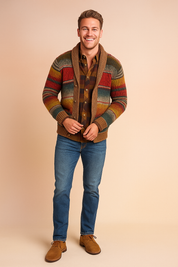 Multicolored striped knit cardigan with a brown shawl collar, button closure, and long sleeves, layered over a brown plaid shirt, paired with blue jeans and brown suede lace-up shoes.