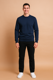 Navy blue crewneck sweatshirt with ribbed cuffs and hem, designed for a clean, modern casual look.