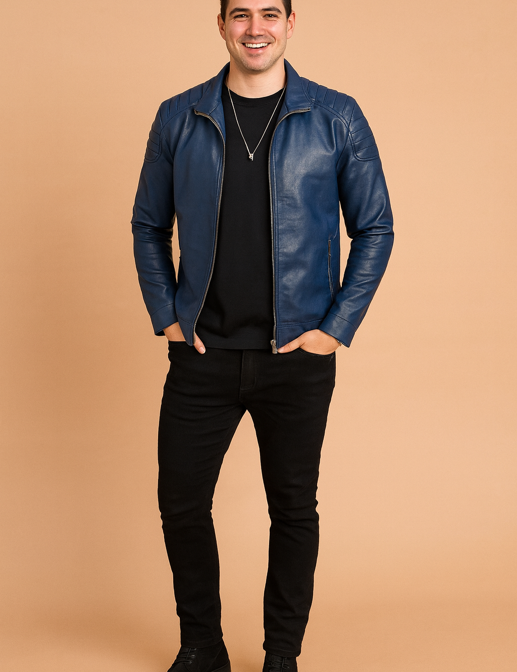 Navy blue leather jacket with quilted shoulder stitching, front zipper closure, and paired with a black t-shirt.