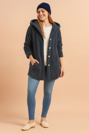 Dark navy hooded button-down winter jacket with textured quilted fabric, long sleeves, front pockets, and relaxed fit for casual comfort.