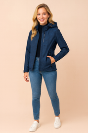Women's navy printed winter jacket with hood, front zipper closure, side zip pockets, and subtle floral pattern detailing