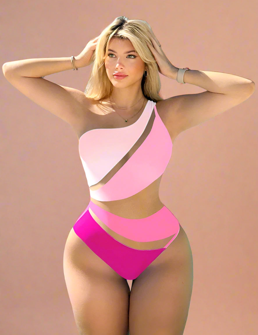 One-shoulder black monokini featuring dramatic asymmetric mesh cut-outs and a circular side ring detail, creating a bold sculpted silhouette with sheer panel contrast.