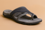 Men’s navy and grey thong sandal with textured suede-like footbed, patterned toe strap, and contrast zigzag stitching on the upper.