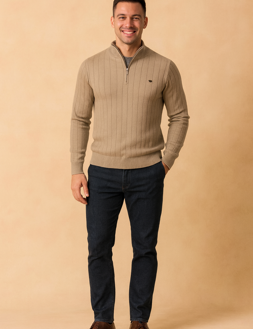 Beige ribbed half-zip sweater for men with long sleeves, slim fit design, and vertical textured pattern. Styled with dark denim jeans and brown leather shoes for a casual yet refined look.