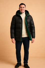 Men's black puffer jacket with green inner lining, front zipper closure, and insulated design for warmth.