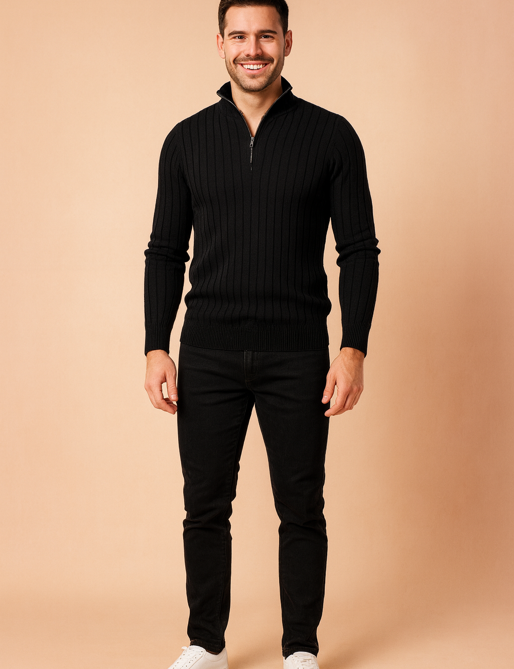 Men’s black ribbed half-zip sweater with vertical textured patterns, styled with slim-fit black jeans and white sneakers.