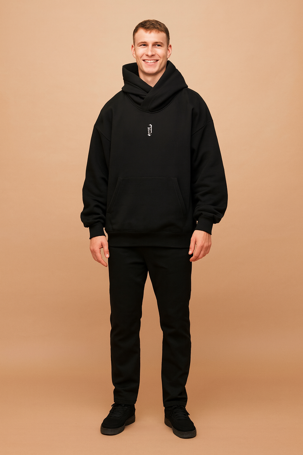 Men’s oversized black hoodie with unique high-neck wrap design, front kangaroo pocket, and embroidered gothic-style letter detail for a bold urban streetwear look.