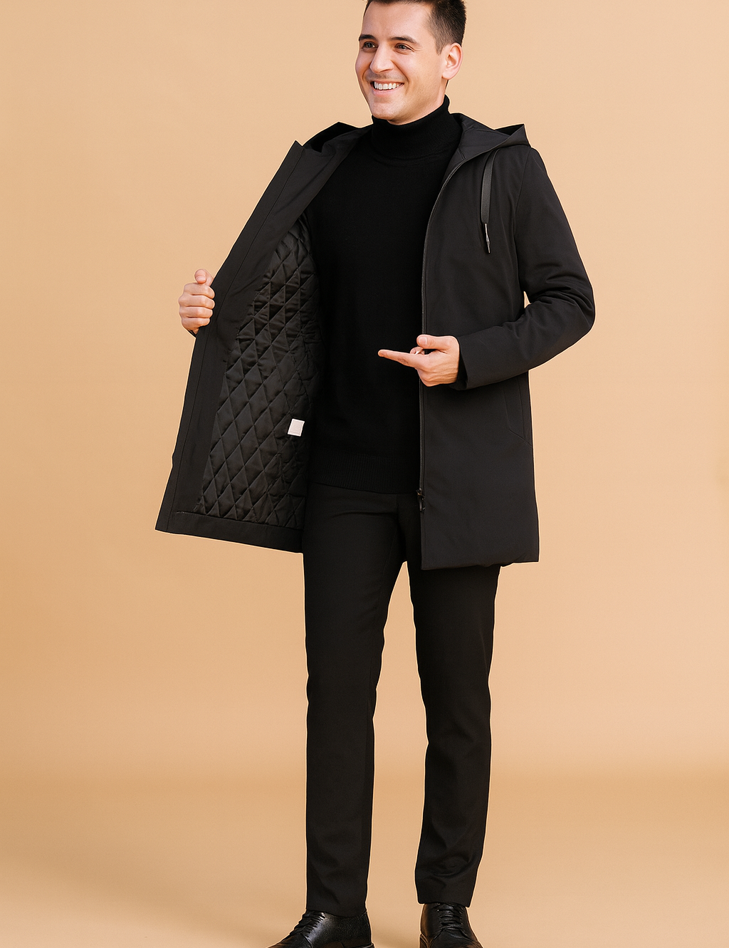 Black hooded long winter coat with quilted inner lining, full front zipper, and sleek modern cut for versatile cold-weather style.