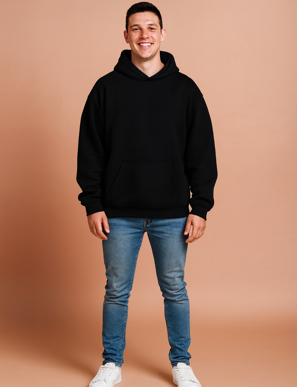 Black pullover hoodie with front kangaroo pocket, ribbed cuffs and hem, and relaxed fit for casual wear.