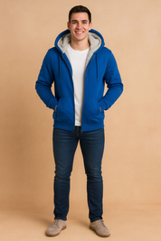 Men’s fleece-lined blue hooded jacket with zip closure, ribbed cuffs, and side pockets, designed for warmth and comfort in winter wear.
