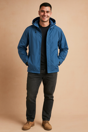 Men’s waterproof blue hooded jacket with zip closure, adjustable drawstrings, and sleek modern fit, ideal for casual wear and outdoor activities.