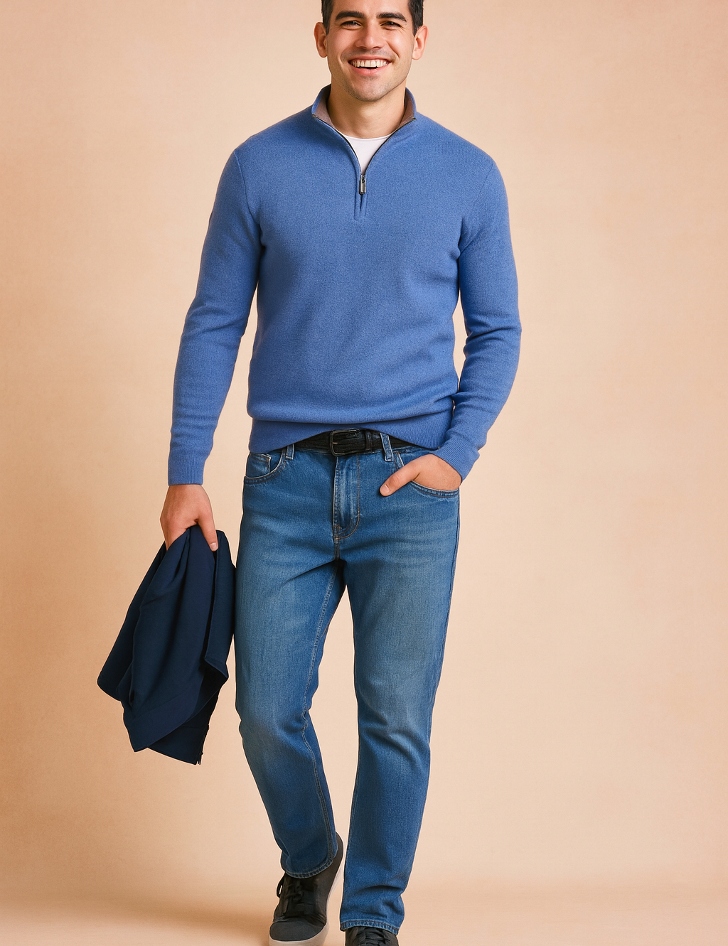 Men’s casual blue zip-neck sweater with ribbed cuffs and hem, paired with straight-fit blue jeans and dark grey sneakers, designed for a modern and comfortable everyday style.