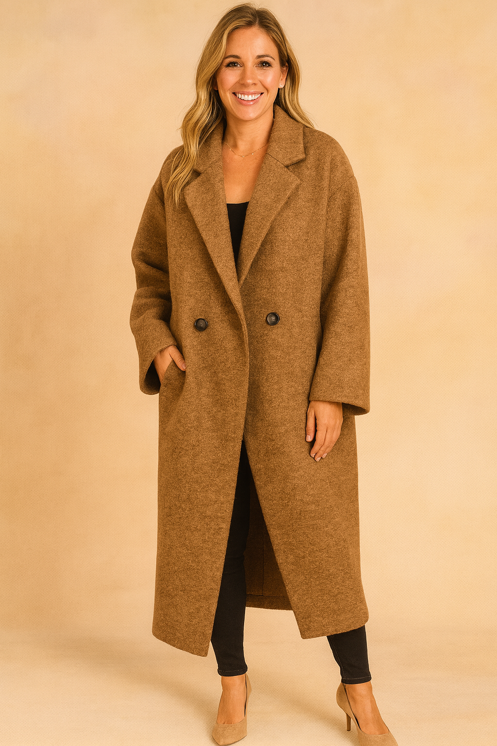 Long oversized brown double-breasted coat with wide lapels, paired with slim black pants and beige heels.