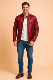 "Men's slim-fit burgundy leather jacket with zippered chest and side pockets, snap-button collar, and detailed stitching for a stylish urban look."