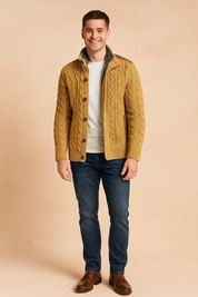 Warm camel-tone cable knit cardigan with a thick textured weave and ribbed cuffs, featuring prominent wood-look buttons and a high stand-up collar lined with plush grey fleece for extra warmth. This stylish men's jacket combines traditional knit patterns with modern inner lining for ultimate winter comfort.
