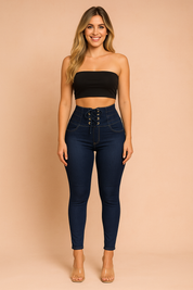 High-waisted dark blue denim jeggings with corset lace-up waist detail, slim fit design, and precise stitching for a flattering silhouette.
