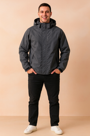 Men’s waterproof hooded windbreaker jacket in dark gray with adjustable cuffs and high-neck closure, designed for outdoor comfort and weather protection.