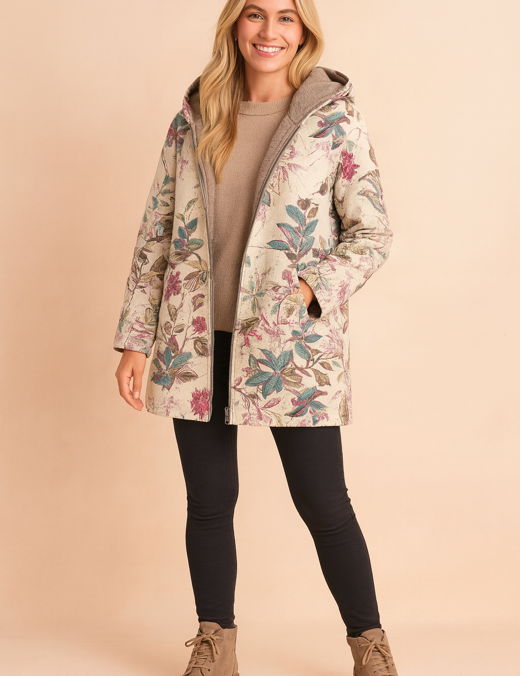 Floral print hooded winter jacket with soft fleece lining, tailored in a relaxed fit for warmth and comfort, featuring a beige base with vibrant pink and green botanical patterns.
