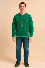 Men’s knitted green crewneck sweater with textured wave pattern and contrasting white ribbed cuffs and hem, styled with a layered white shirt for a modern casual look.