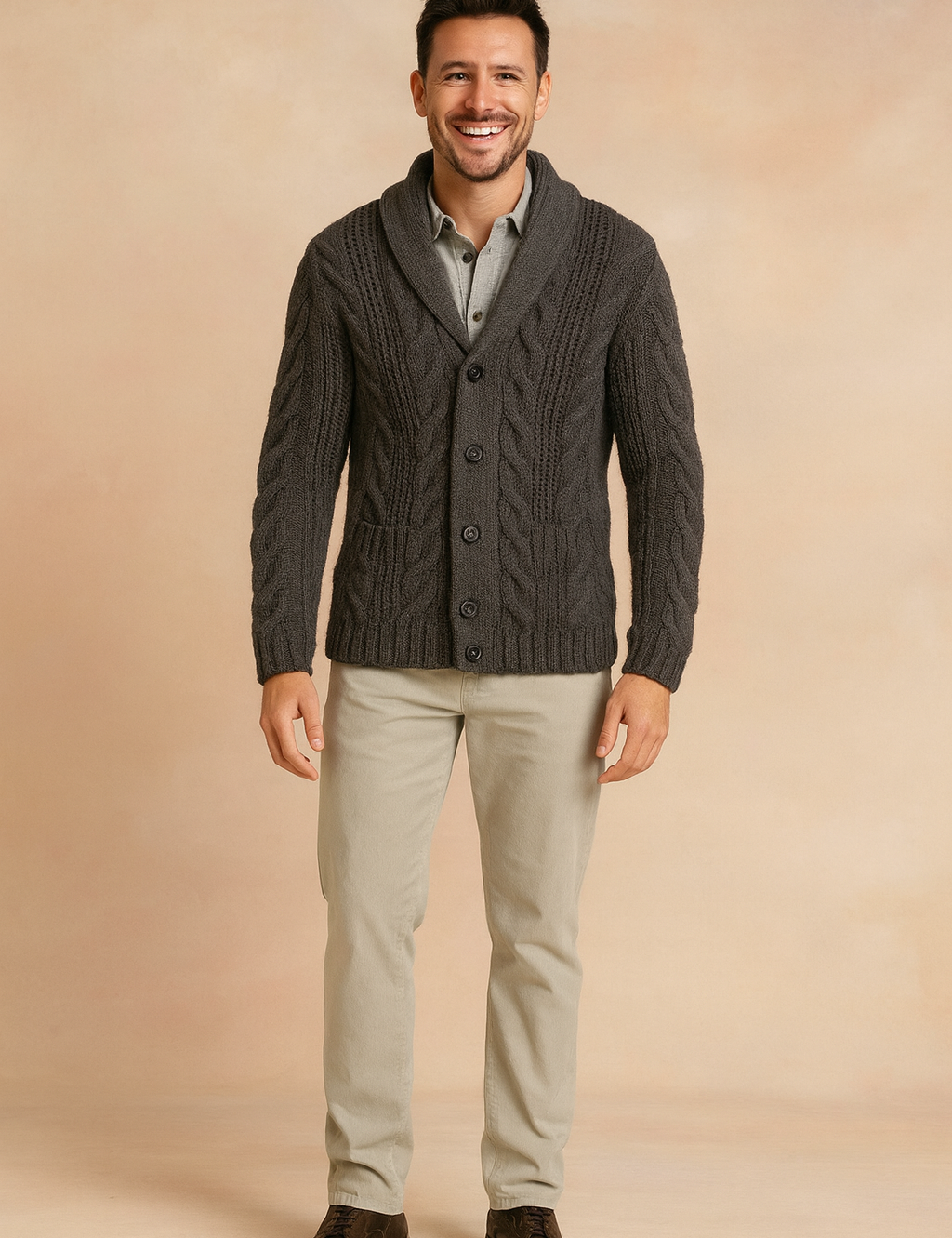 Grey cable-knit shawl collar cardigan with button front, featuring a textured cable pattern for a stylish and cozy winter look.