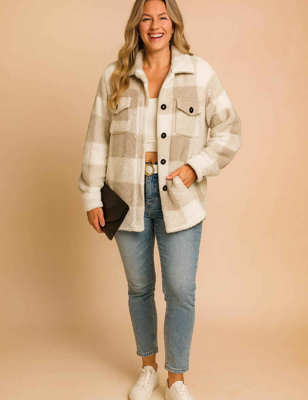 Plaid fleece button-up jacket in cream and taupe, featuring two chest flap pockets and a relaxed oversized fit, paired with light-wash slim jeans and white sneakers.