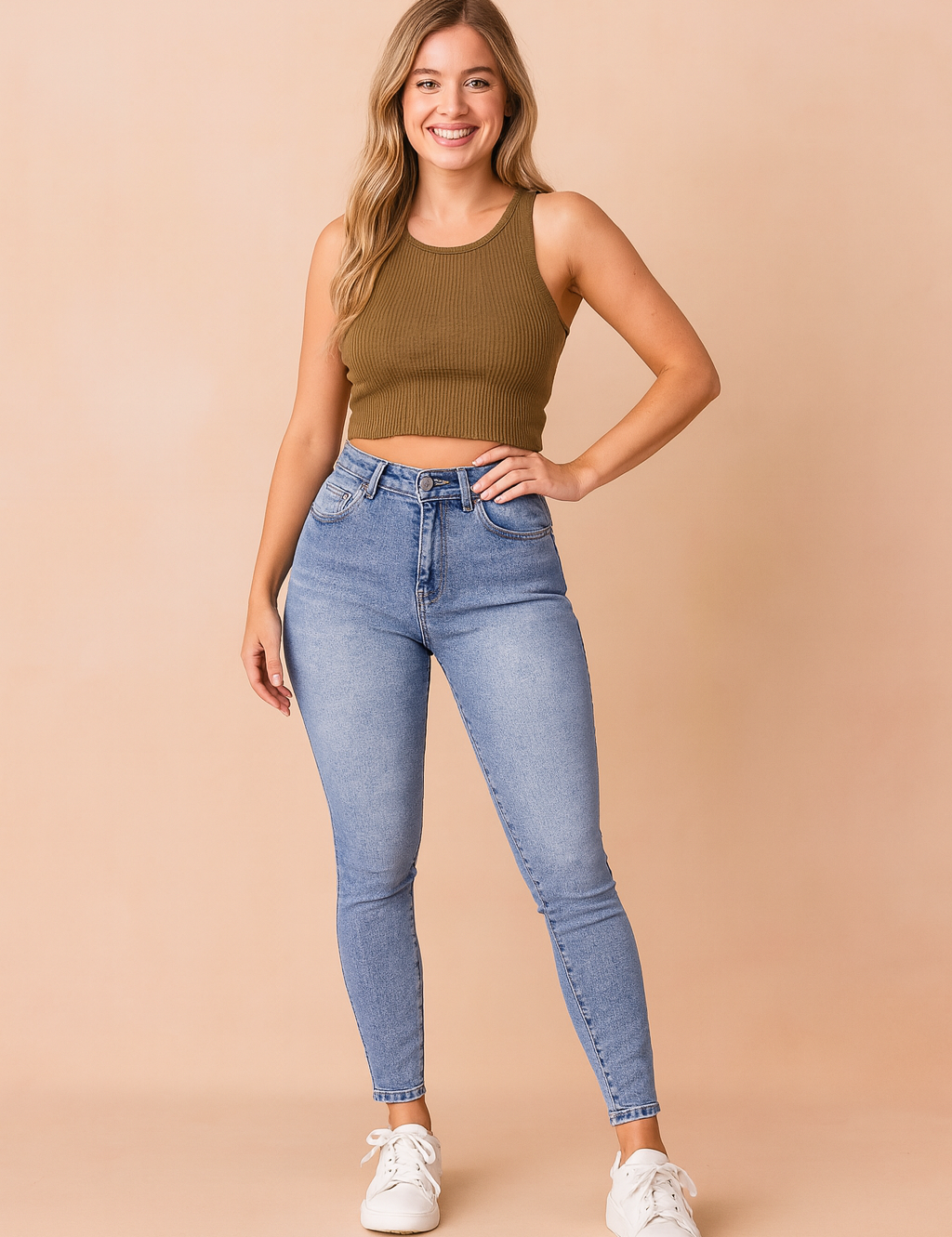 Light blue high-waisted skinny jeans with a faded wash design, paired with classic white sneakers