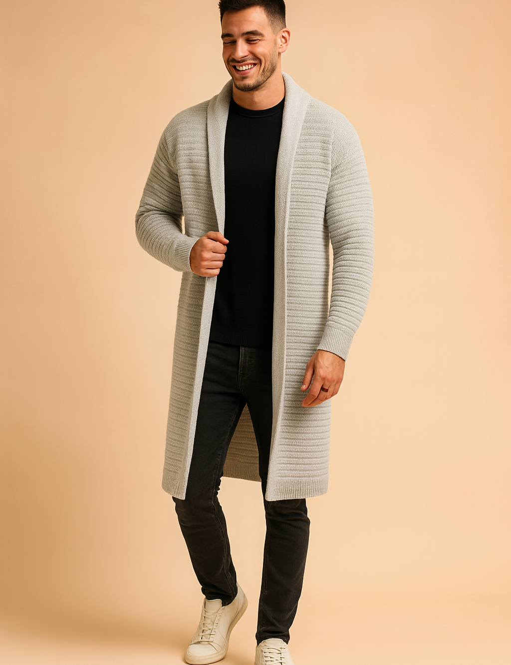 Long light grey knit cardigan with ribbed texture, open-front design, ribbed cuffs, and a sleek modern fit paired with a black shirt and dark jeans.