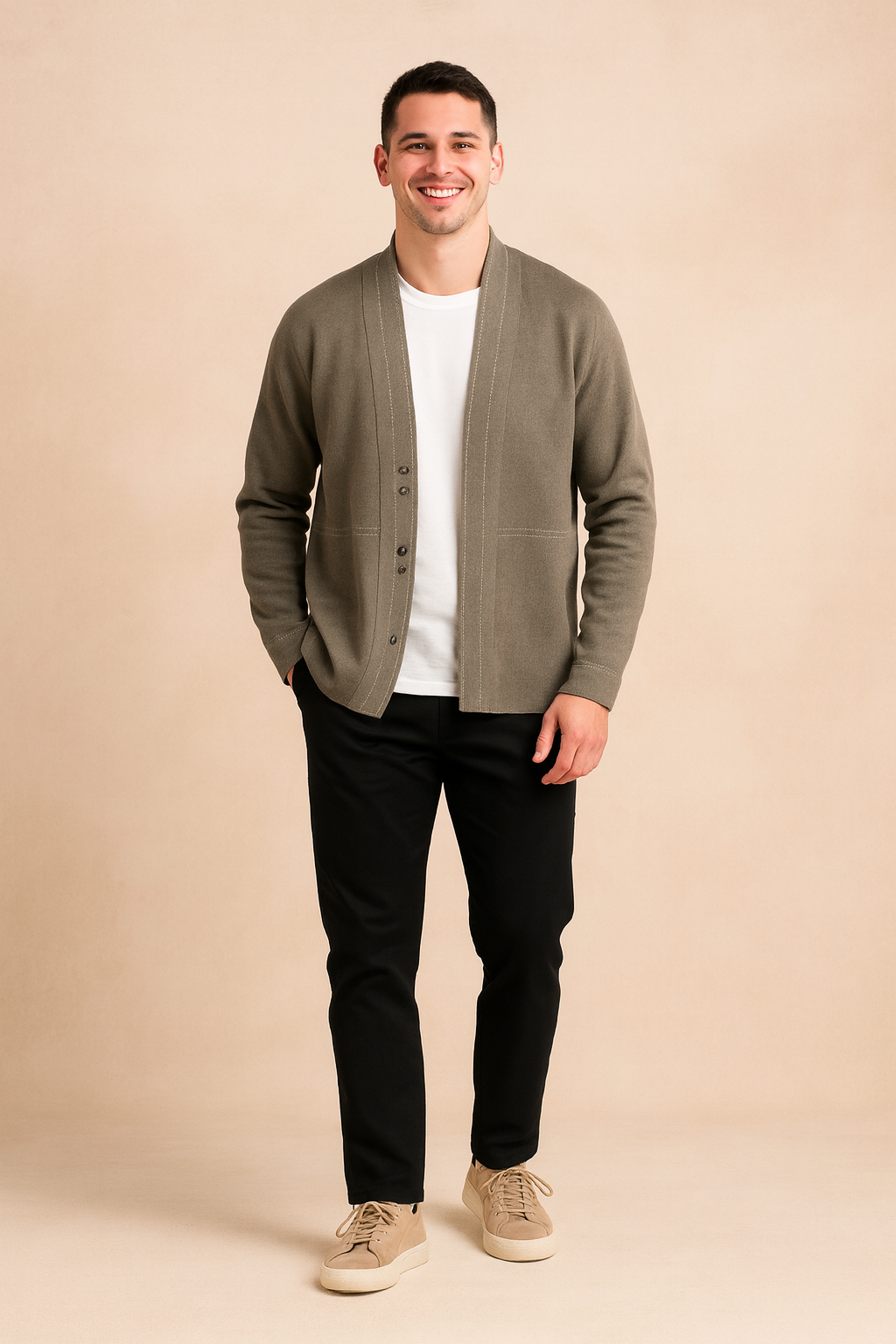 Light olive green men's button-up cardigan with wide shawl collar and subtle horizontal seam detailing; minimalist design with fine contrast stitching and clean front finish over a plain white inner shirt.