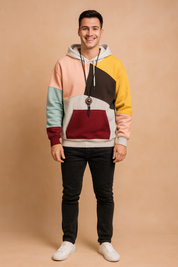 Color-block patchwork hoodie for men with kangaroo pocket in pink, yellow, blue, burgundy, and grey tones.