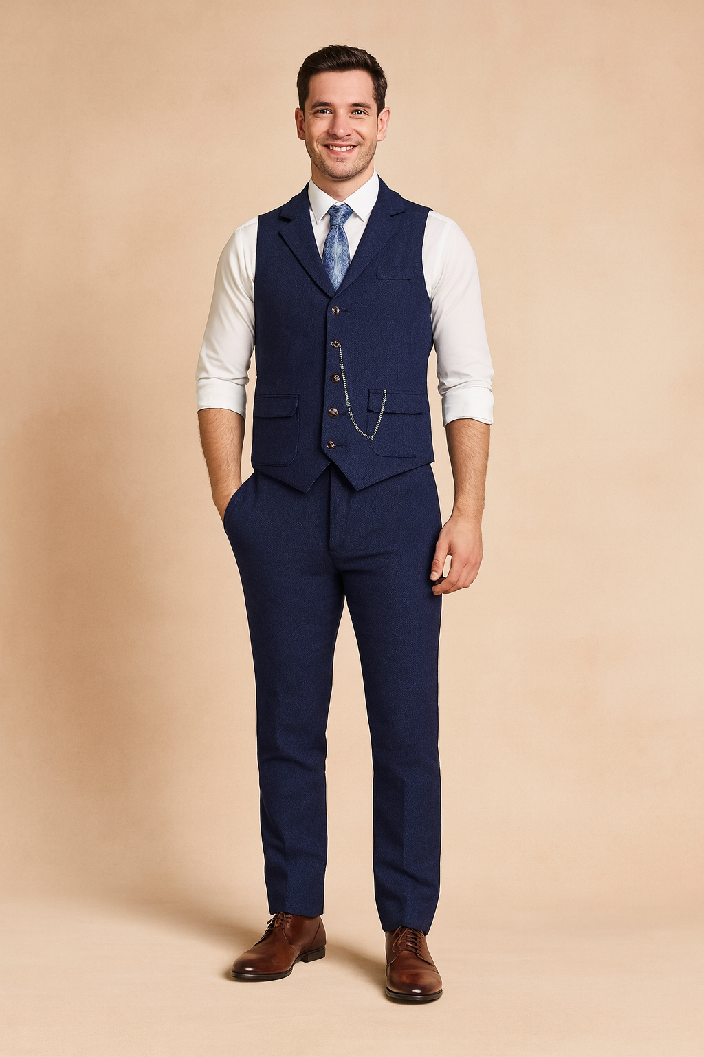 Elegant navy vintage-style men’s waistcoat with classic button closure, tailored fit, flap pockets, and a paisley tie, designed for formal and semi-formal occasions.