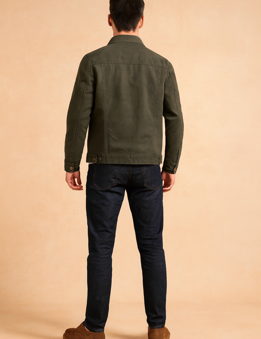 Men’s olive green denim jacket with structured seams, buttoned cuffs, adjustable hem tabs, and a straight tailored fit, designed for a casual yet rugged look.