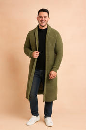 Ribbed longline olive-green cardigan with open front design, paired with a black crew-neck shirt and dark jeans for a sleek, urban layering style.