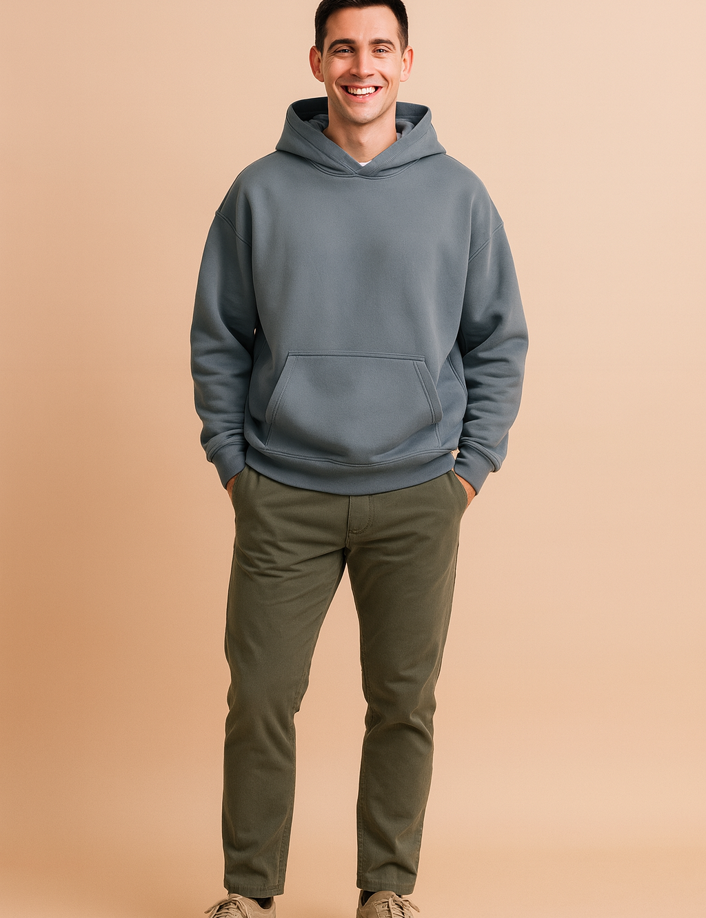 Oversized stone gray hoodie with classic kangaroo pocket and dropped shoulders, featuring a smooth matte finish and structured cuffs for a relaxed streetwear silhouette.