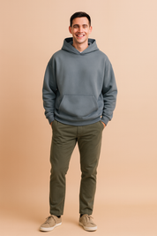 Oversized stone gray hoodie with classic kangaroo pocket and dropped shoulders, featuring a smooth matte finish and structured cuffs for a relaxed streetwear silhouette.