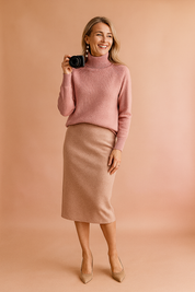 Dusty pink turtleneck sweater with ribbed neckline and cuffs, styled with a soft beige pencil skirt and nude pointed-toe heels