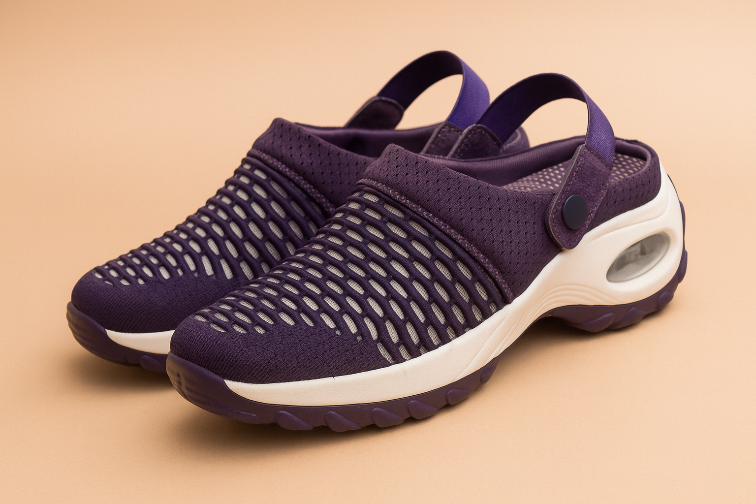 Breathable purple mesh slip-on clogs with a white cushioned sole, featuring a scale-like knit pattern, supportive heel strap, and visible air cushion unit.