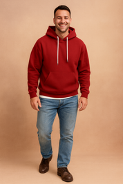 Men’s casual red pullover hoodie with adjustable white drawstrings, kangaroo pocket, and ribbed cuffs and hem for a relaxed fit.