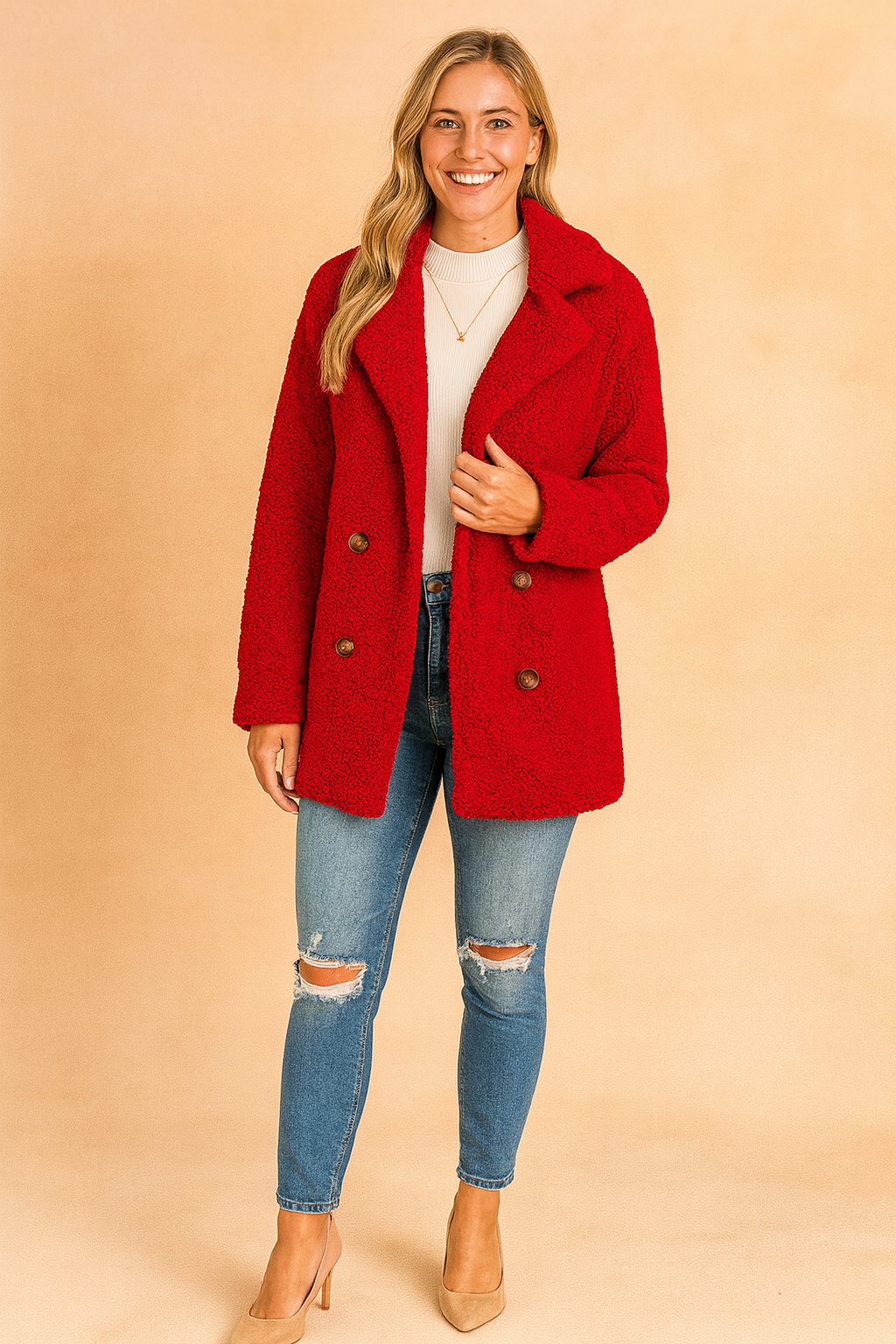 Red double-breasted teddy-texture coat with wide lapels, paired with white turtleneck, ripped skinny jeans, and beige heels