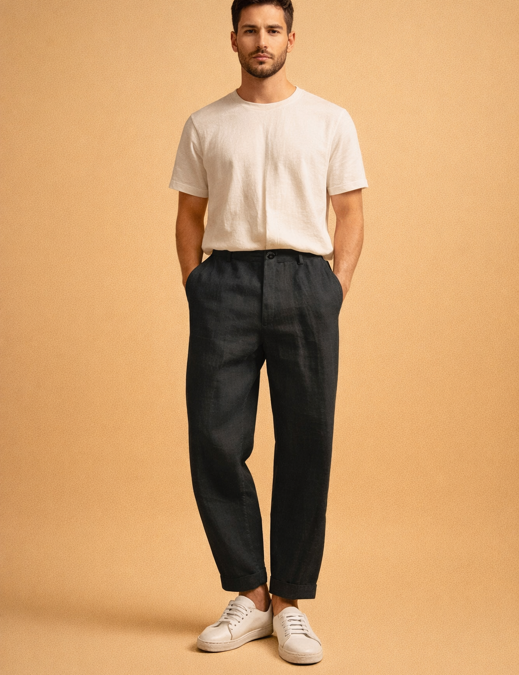 Men’s tailored white trousers with a clean straight-leg cut, flat front waistband, belt loops, front pockets, ankle-length finish, styled with minimal low-profile white sneakers for a refined modern look.